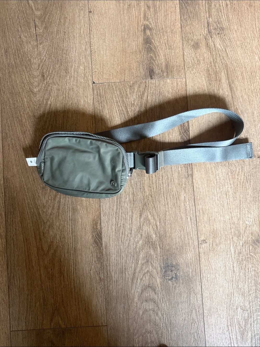 lululemon athletica olive green belt bag with light gray strap